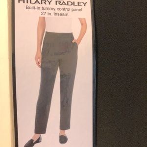 2 pairs of black work pants. Size small